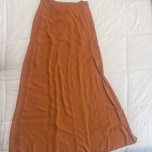 Long orange skirt. Good condition.